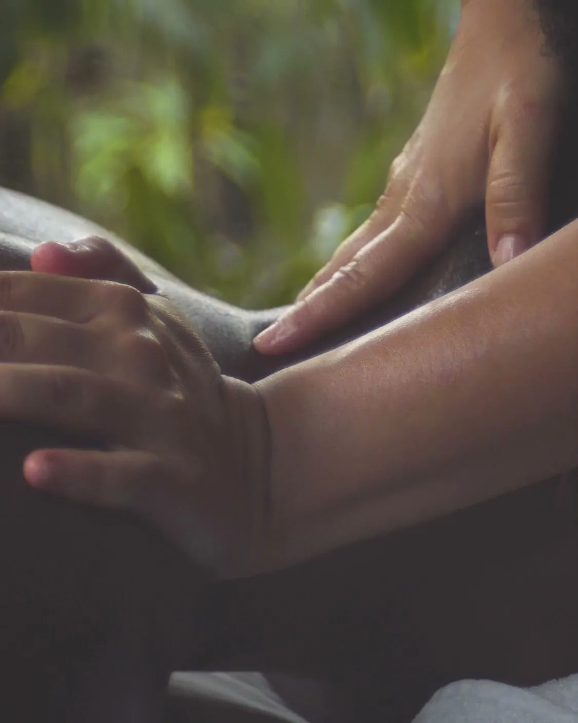 Massage in Playa del Carmen: a Botica Spa therapist working on a guest's arm