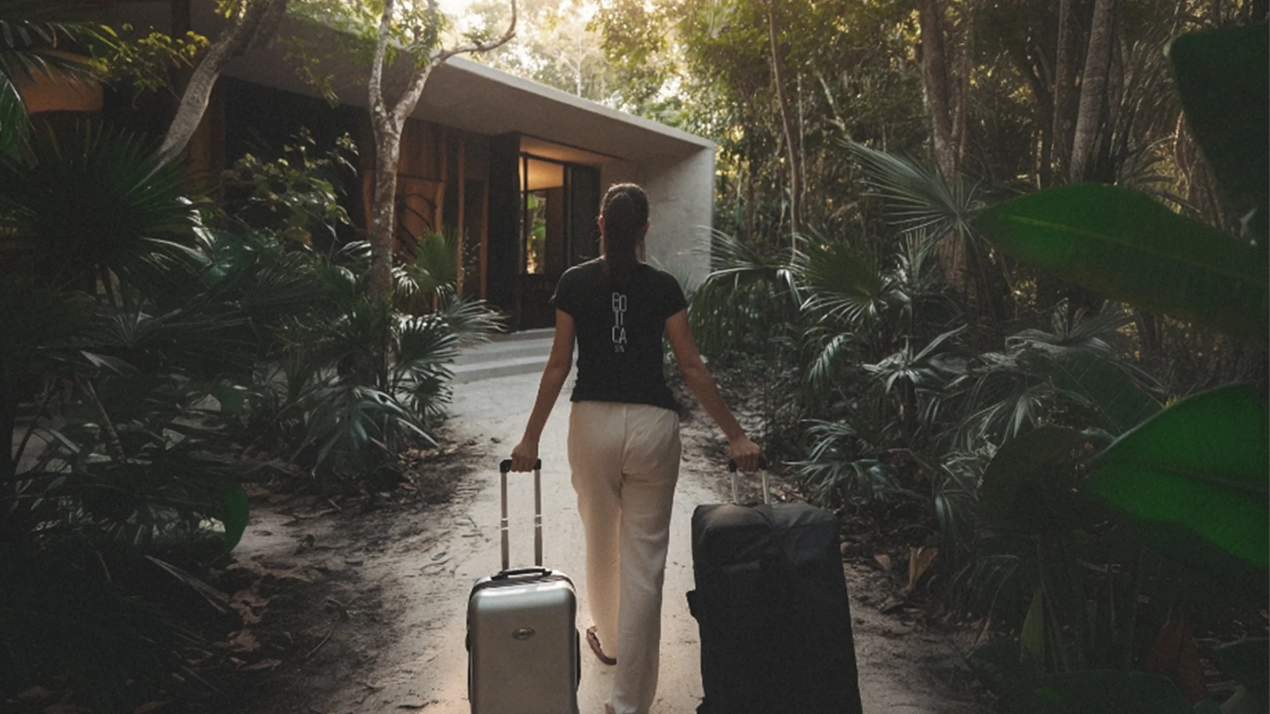 Botica Spa therapist arriving with her massage table at a villa in Playa del Carmen
